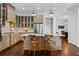 Modern kitchen with an island, stainless steel appliances, and wooden cabinets at 2908 Old Drake Dr, Seabrook Island, SC 29455
