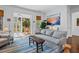 Living room with view of screened porch and natural landscape at 2908 Old Drake Dr, Seabrook Island, SC 29455