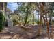 Landscaped backyard with mature trees and tranquil setting at 2908 Old Drake Dr, Seabrook Island, SC 29455