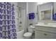 Clean bathroom with white vanity, shower/tub combo, and patterned shower curtain at 304 Bloomington Way, Summerville, SC 29486