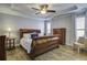 Spacious primary bedroom with hardwood floors and ceiling fan at 304 Bloomington Way, Summerville, SC 29486