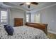 Primary bedroom with hardwood floors and wooden dresser at 304 Bloomington Way, Summerville, SC 29486