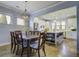 Bright dining room with hardwood floors and chandelier at 304 Bloomington Way, Summerville, SC 29486