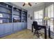 Home office with built-in shelving, desk, and window seating at 304 Bloomington Way, Summerville, SC 29486