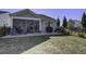 Back exterior view showing patio, screened porch and fenced backyard at 304 Bloomington Way, Summerville, SC 29486