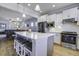Open concept kitchen island with stainless steel appliances at 304 Bloomington Way, Summerville, SC 29486