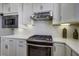 Stainless steel appliances and white shaker cabinets at 304 Bloomington Way, Summerville, SC 29486