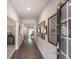 Bright and spacious entryway with hardwood floors and elegant mirrors at 322 Calm Water Way, Summerville, SC 29486