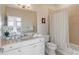 Cozy bathroom with vanity, sink and shower/tub combo with curtain at 355 Cooper River Dr, Mount Pleasant, SC 29464