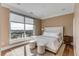 The bedroom features a large window overlooking the outdoor scenery at 355 Cooper River Dr, Mount Pleasant, SC 29464