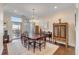 Elegant dining room with hardwood floors, stylish furniture, and a beautiful chandelier at 355 Cooper River Dr, Mount Pleasant, SC 29464