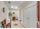 Elegant hallway featuring neutral walls, tile floors, and decorative accents at 355 Cooper River Dr, Mount Pleasant, SC 29464