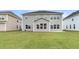 Gray house with a large backyard and patio at 3725 Grange Cir, Summerville, SC 29486