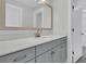 Modern bathroom with single vanity and mirror at 3725 Grange Cir, Summerville, SC 29486
