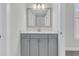 Modern bathroom vanity with gray cabinets and a quartz countertop at 3725 Grange Cir, Summerville, SC 29486