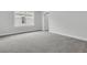Bright bedroom featuring gray carpeting and a window with natural light at 3725 Grange Cir, Summerville, SC 29486