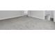 Spacious bedroom with gray carpeting and an open door to another room at 3725 Grange Cir, Summerville, SC 29486