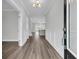 Bright entryway with hardwood floors and white wainscoting at 3725 Grange Cir, Summerville, SC 29486