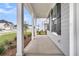 Covered front porch with white columns and gray siding at 3725 Grange Cir, Summerville, SC 29486