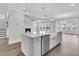 Modern kitchen with gray cabinets, quartz countertops, and island at 3725 Grange Cir, Summerville, SC 29486