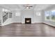 Spacious living room with fireplace and hardwood floors at 3725 Grange Cir, Summerville, SC 29486