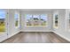 Sunroom featuring hardwood floors and multiple windows at 3725 Grange Cir, Summerville, SC 29486