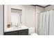 Clean bathroom featuring single sink vanity with modern fixtures and walk-in shower at 380 Dike Rd, Bonneau, SC 29431