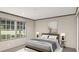 Inviting bedroom with modern décor, neutral walls, and lots of natural light at 380 Dike Rd, Bonneau, SC 29431