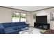 Cozy living room with comfortable seating, contemporary décor, and lots of natural light at 380 Dike Rd, Bonneau, SC 29431