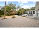 Brick patio, fire pit, and access to pool area at 3906 Waterway Blvd, Isle of Palms, SC 29451