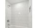 Simple bathroom with a shower/tub and subway tile at 3906 Waterway Blvd, Isle of Palms, SC 29451