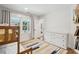 Bright bedroom with bunk beds, dresser, and access to a back patio at 3906 Waterway Blvd, Isle of Palms, SC 29451