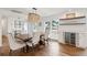 Elegant dining room featuring a wood table and shell chandelier at 3906 Waterway Blvd, Isle of Palms, SC 29451