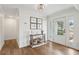 Bright and airy foyer with hardwood floors and coastal decor at 3906 Waterway Blvd, Isle of Palms, SC 29451