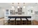 Stunning kitchen island with white quartz countertops and navy blue cabinetry at 3906 Waterway Blvd, Isle of Palms, SC 29451
