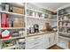 Well-organized pantry with ample shelving and counter space at 3906 Waterway Blvd, Isle of Palms, SC 29451