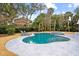 Irregular shaped pool and spa with large patio at 3906 Waterway Blvd, Isle of Palms, SC 29451