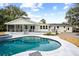 Inviting backyard oasis featuring a sparkling pool and spacious deck at 3906 Waterway Blvd, Isle of Palms, SC 29451