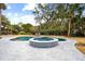Freeform pool and spa with blue tile accents at 3906 Waterway Blvd, Isle of Palms, SC 29451