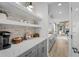 Gray kitchen cabinets with white quartz countertops and built-in coffee station at 391 Wappoo Trace Ln, Summerville, SC 29486