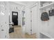 Bright entryway with built-in shelving and hardwood floors at 391 Wappoo Trace Ln, Summerville, SC 29486