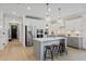 Open concept kitchen features stainless steel appliances and a large island at 391 Wappoo Trace Ln, Summerville, SC 29486