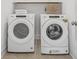 Convenient laundry room with Whirlpool washer and dryer at 391 Wappoo Trace Ln, Summerville, SC 29486