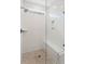 Walk-in shower with herringbone tile, built-in bench, and glass enclosure at 391 Wappoo Trace Ln, Summerville, SC 29486