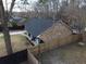 House with new black roof and fenced backyard at 402 Citadel St, Ladson, SC 29456
