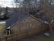 Rear view of house showcasing brick exterior and roof at 402 Citadel St, Ladson, SC 29456
