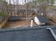 Aerial view of the backyard showing pergola, shed, and patio at 402 Citadel St, Ladson, SC 29456