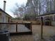Large backyard with a wooden deck, pergola, and shed at 402 Citadel St, Ladson, SC 29456