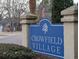 Blue and white community sign for Crowfield Village at 402 Citadel St, Ladson, SC 29456