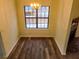 Bright dining area with hardwood floors and large window at 402 Citadel St, Ladson, SC 29456